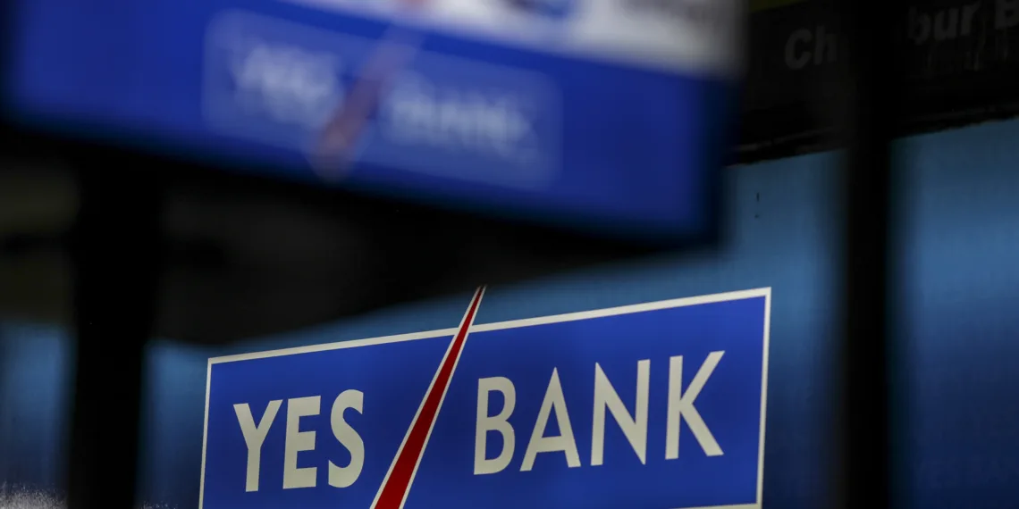 A Logo Of Yes Bank Ltd. Sit On Bank'S Branch In Mumbai, India, On Tuesday, April 30, 2019. Photographer: Dhiraj Singh/Bloomberg